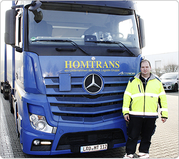 MItarbeiter vor HOMTRANS Truck